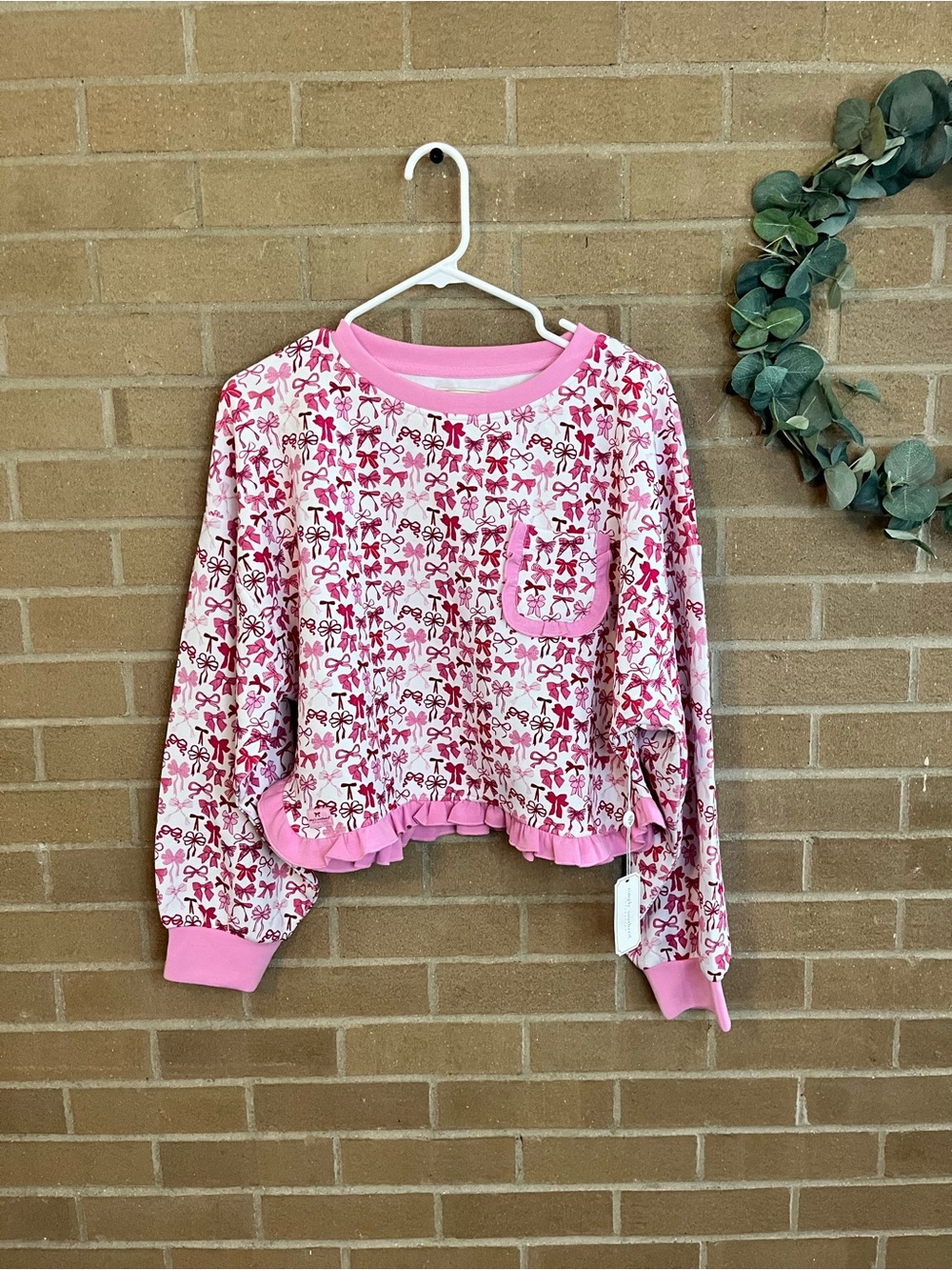 Simply Southern Pink Bow-Print Long Sleeve Top with Ruffle Hem